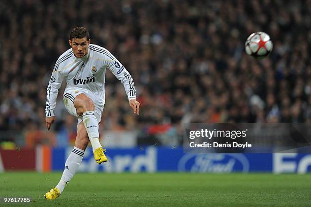 Cristiano Ronaldo of Real Madrid takes a free kick during the UEFA Champions League round of 16 2nd leg match between Real Madrid and Olympique...