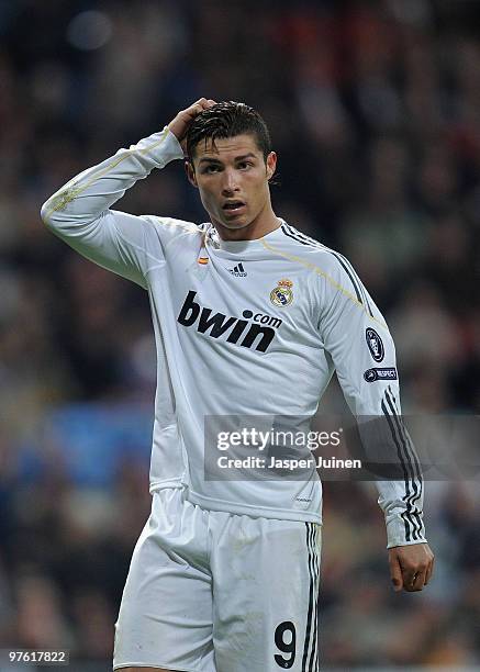 Cristiano Ronaldo of Real Madrid reacts during the UEFA Champions League round of 16 second leg match between Real Madrid and Lyon at the Estadio...