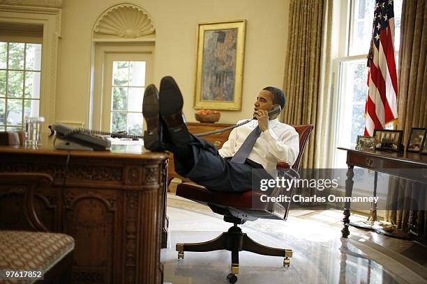 President Barack Obama prepares to make a statement after trilateral talks with Afghan President Hamid Karzai and Pakistani Prime Minister Asif Ali...