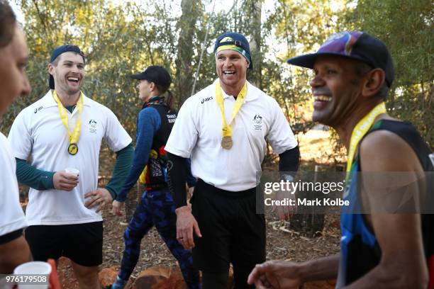 Australian olympic bobsledders Hayden Smith and Lachlan Reidy share a laugh with other runners after they ran in the Deadly Fun Run during the the...