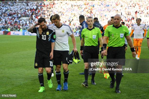 Lionel Messi of Argentina is consoled by team mate Cristian Ansaldi during the 2018 FIFA World Cup Russia group D match between Argentina and Iceland...