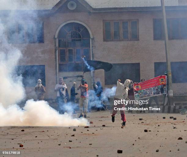 Protesters clash with police and paramilitary soldiers after Eid-ul-Fitr prayers at Eidgah, on June 16, 2018 in Srinagar, India. Multiple clashes...