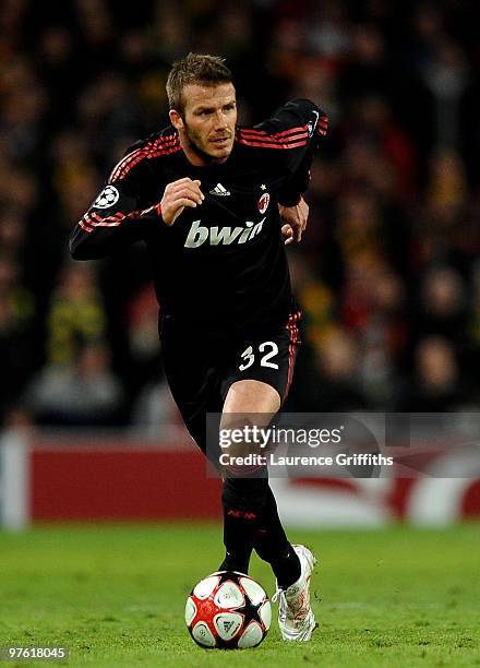 David Beckham of AC Milan on the ball during the UEFA Champions League First Knockout Round, second leg match between Manchester United and AC Milan...