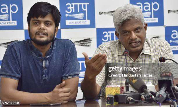 Pankaj Gupta, National Secretary of the Aam Aadmi Party , and AAP Media Manager Vikas Yogi address media persons on the issue of IAS officers...