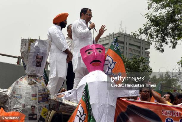 West Delhi Member of Parliament Parvesh Verma and BJP MLA from Rajouri Garden Manjinder Singh Sirsa with party workers and supporters protest against...