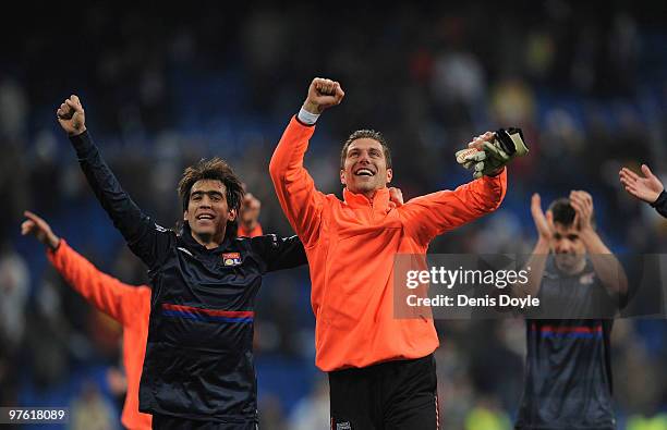 Cesar Delgado of Olympique Lyonnais celebrates victory after the UEFA Champions League round of 16 2nd leg match between Real Madrid and Olympique...