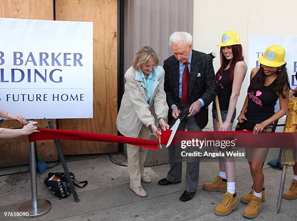 President Ingrid Newkirk and television personality Bob Barker attend the ribbon cutting ceremony for PETA's new 'Bob Barker Building' on March 10,...