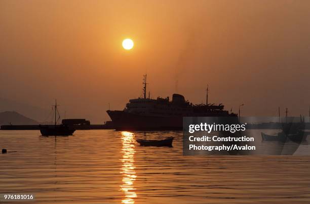 Ferry at harbour of Samos at sunset - island of Samos - Eastern Sporades islands - Greece.