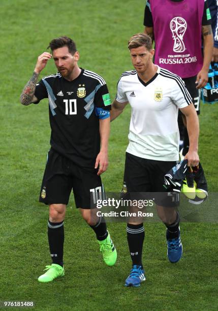 Lionel Messi of Argentina is consoled by team mate Cristian Ansaldi during the 2018 FIFA World Cup Russia group D match between Argentina and Iceland...