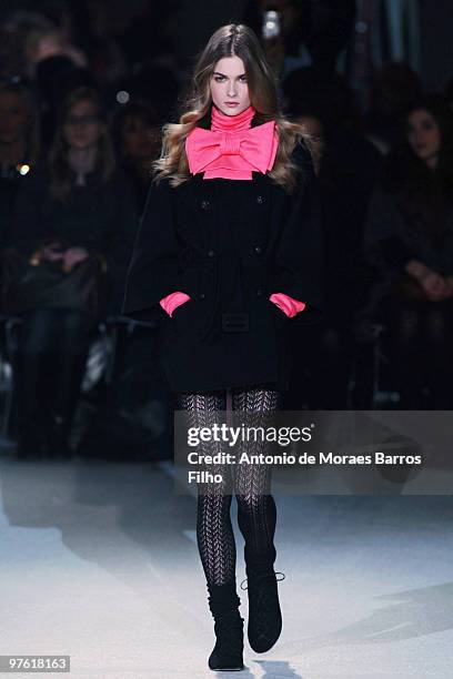 Model walks the runwayduring the Paul & Joe Ready to Wear show as part of the Paris Womenswear Fashion Week Fall/Winter 2011 at Halle Freyssinet on...