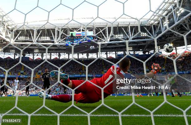 Hannes Halldorsson of Iceland saves a penalty kick from Lionel Messi of Argentina during the 2018 FIFA World Cup Russia group D match between...