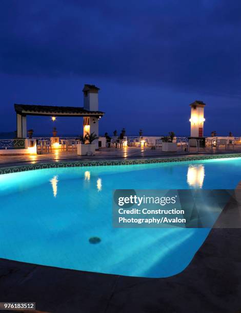 Swimming pool at terrace restaurant la gritta at evening - apartment resort cala fornells - village of Paguera - island of Mallorca - Balearic...