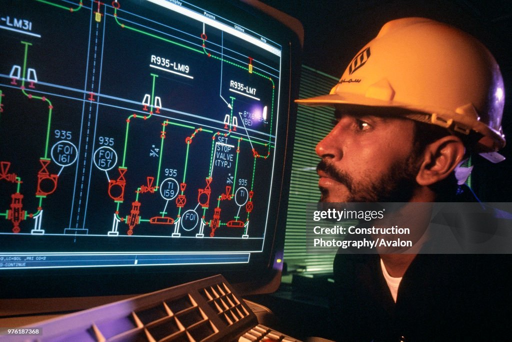 Oil refinery control room. Saudi Arabia.