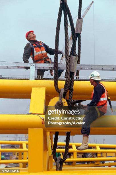 Preparation for erection of strut for Millennium Dome, London, United Kingdom, Dome designed by Richard Rogers Partnership,.