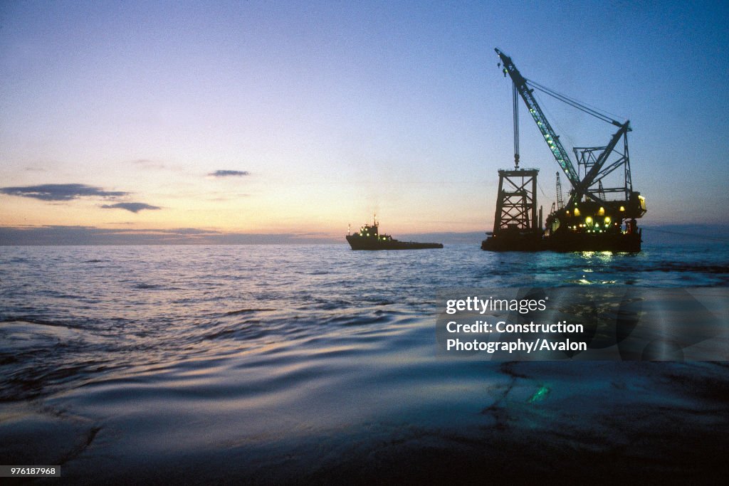 Installing gas production platform with crane barge. Southern North Sea off Great Yarmouth, United Kingdom.