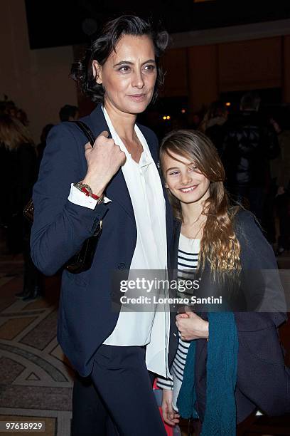 Ines De La Fressange and her daughter Nine attend the Yves Saint Laurent Exhibition at Le Petit Palais on March 10, 2010 in Paris, France.