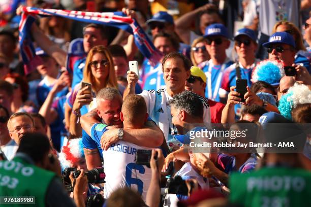 Ragnar Sigurdsson of Iceland and Aron Gunnarsson of Iceland celebrate in the crowd at the end of the 2018 FIFA World Cup Russia group D match between...