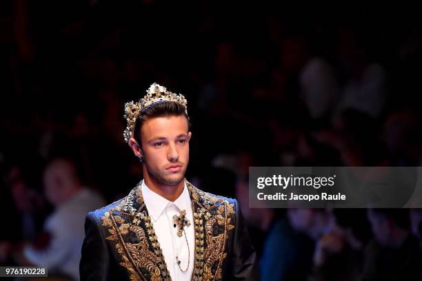 Cameron Dallas walks the runway at the Dolce & Gabbana show during Milan Men's Fashion Week Spring/Summer 2019 on June 16, 2018 in Milan, Italy.