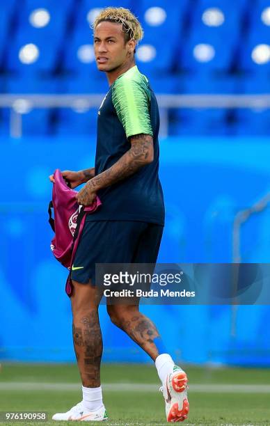 Neymar Jr of Brazil looks on during a Brazil training session ahead of the FIFA World Cup 2018 at Rostov Arena on June 16, 2018 in Rostov-on-Don,...
