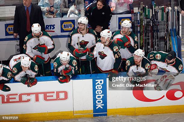 Marek Zidlicky, Brent Burns, Cam Barker and Greg Zanon of the Minnesota Wild watch the action against the Edmonton Oilers on March 5, 2010 at Rexall...