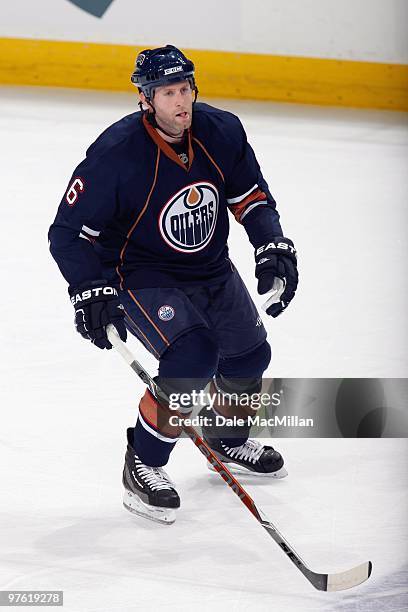 Ryan Whitney of the Edmonton Oilers skates against the Minnesota Wild on March 5, 2010 at Rexall Place in Edmonton, Alberta, Canada.