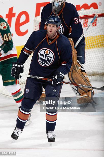 Ryan Whitney of the Edmonton Oilers skates against the Minnesota Wild on March 5, 2010 at Rexall Place in Edmonton, Alberta, Canada.