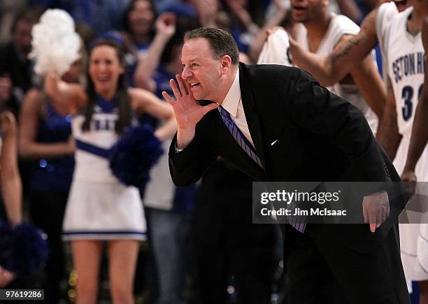 Head coach Bobby Gonzalez of the Seton Hall Pirates gestures from the bench against the Providence Friars during the first round game of the Big East...