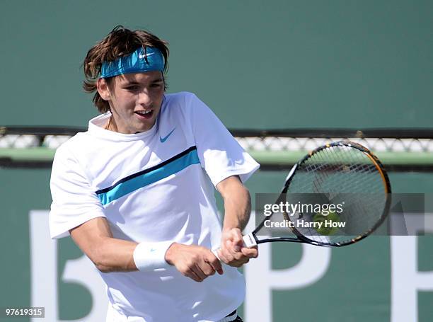 Filip Krajinovic of Serbia returns a backhand against Tim Smyczek during the BNP Paribas Open at the Indian Wells Tennis Garden on March 10, 2010 in...