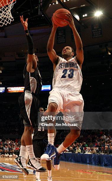 Robert Mitchell of the Seton Hall Pirates drives to the hoop against the Providence Friars during the first round game of the Big East Basketball...