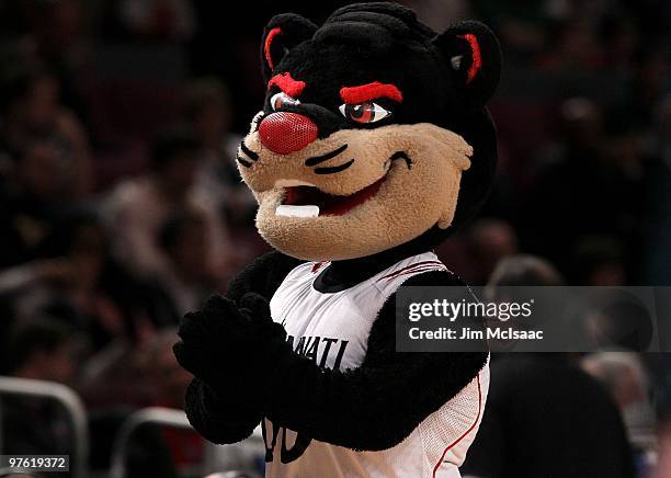The Cincinnati Bearcats mascot walks on court against the Rutgers Scarlet Knights during the first round game of the Big East Basketball Tournament...