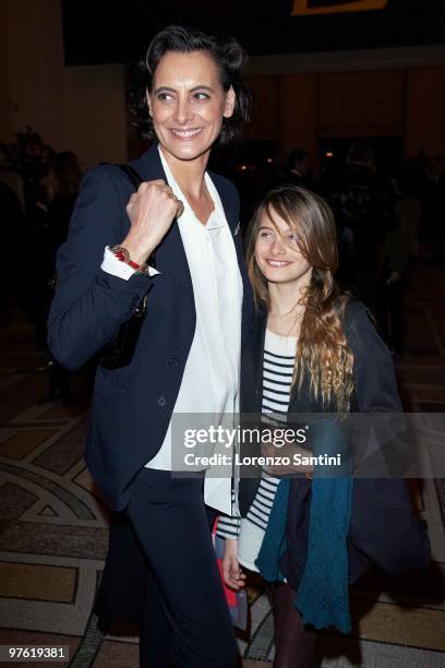 Ines De La Fressange and her daughter Nine attend the Yves Saint Laurent Exhibition at Le Petit Palais on March 10, 2010 in Paris, France.