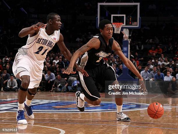 Marshon Brooks of the Providence Friars handles the ball against Jeremy Hazell of the Seton Hall Pirates during the first round game of the Big East...