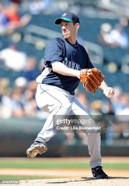 Cliff Lee of the Seattle Mariners pitches during a spring training game against the Texas Rangers on March 10, 2010 at Surprise Stadium in Surprise,...