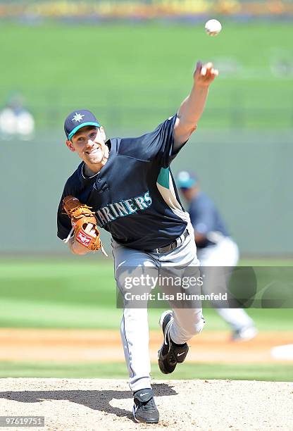 Cliff Lee of the Seattle Mariners pitches during a spring training game against of the Texas Rangers on March 10, 2010 at Surprise Stadium in...