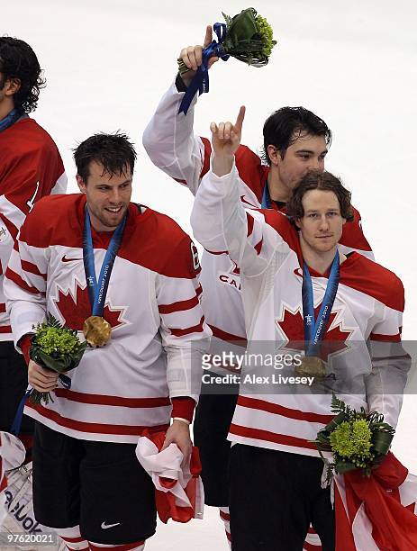 Shea Weber, Drew Doughty and Duncan Keith of Canada celebrate after the ice hockey men's gold medal game between USA and Canada on day 17 of the...
