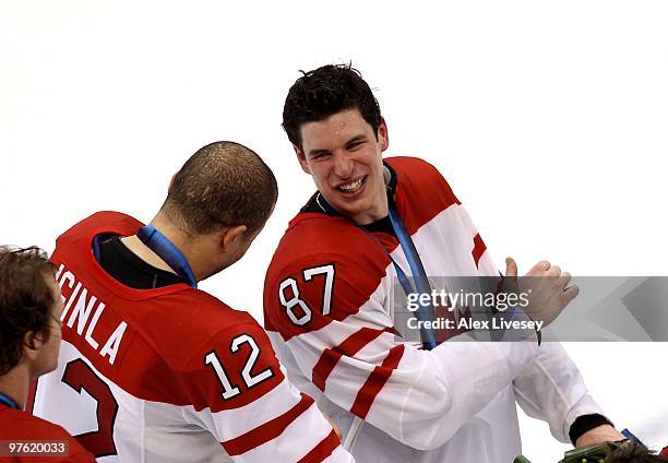 Sidney Crosby of Canada smiles along with Jarome Iginla after the ice hockey men's gold medal game between USA and Canada on day 17 of the Vancouver...