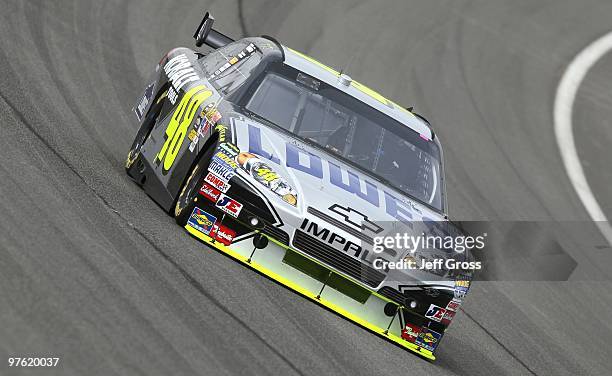 Jimmie Johnson, driver of the Lowe's Chevrolet during practice for the NASCAR Sprint Cup Series Auto Club 500 at Auto Club Speedway on February 19,...