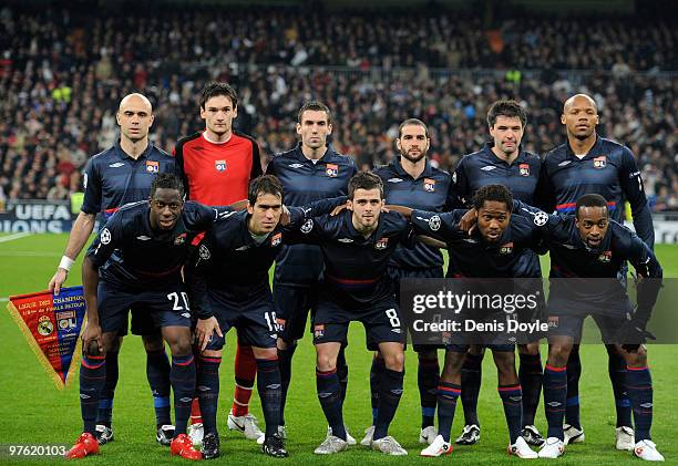 The Olympique Lyon team line-up before the start of the UEFA Champions League round of 16 2nd leg match between Real Madrid and Olympique Lyonnais at...
