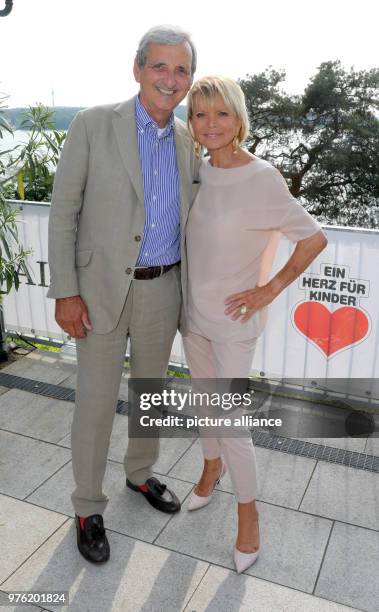 June 2018, Germany, Berlin: Actress Uschi Glas and husband Dieter Hermann arriving to BILD hilft e.V.'s summer festival "A heart for children"....