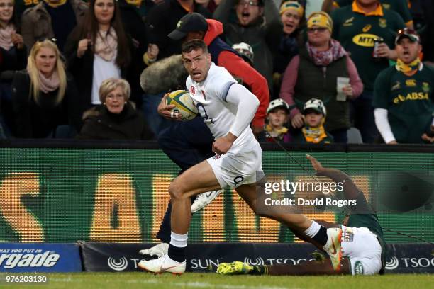 Jonny May of England goes over to score his team's second try during the second test match between South Africa and England on June 16, 2018 in...