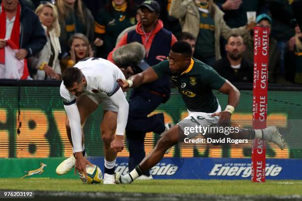 Jonny May of England goes over to score his team's second try during the second test match between South Africa and England on June 16, 2018 in...