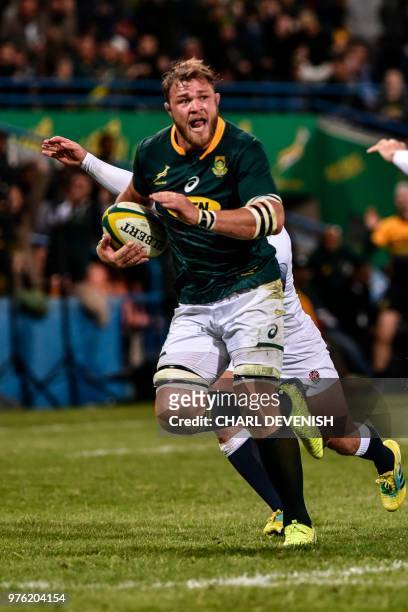 South Africas Duane Vermeulen runs on his way to score a try during the second test match South Africa vs England at the Free State Stadium in...