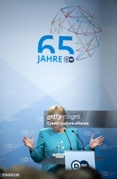 June 2018, Germany, Berlin: German Chancellor Angela Merkel of the Christian Democratic Union delivers a speech during the ceremony '65 Jahre...