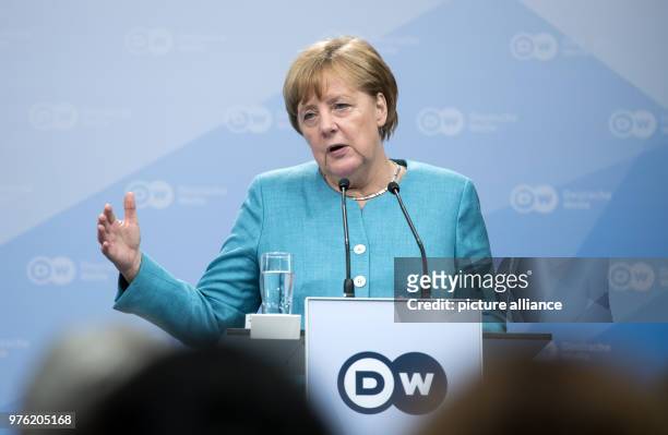 June 2018, Germany, Berlin: German Chancellor Angela Merkel of the Christian Democratic Union delivers a speech during the ceremony '65 Jahre...