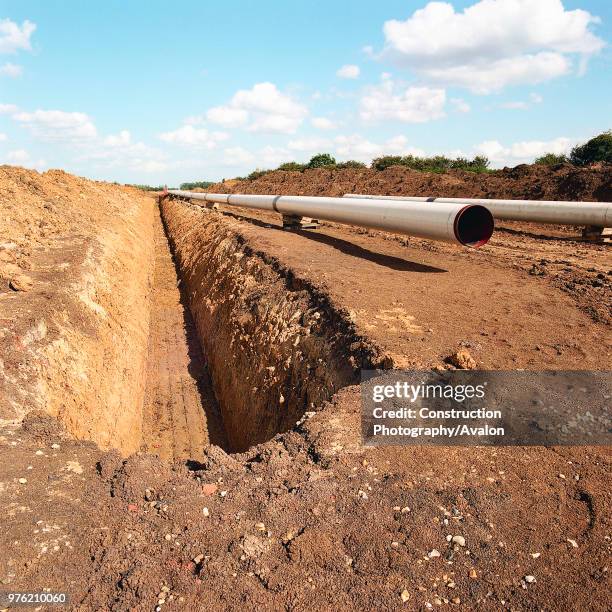 Excavated trench on the Essex marshes to install gas supply pipework for the Barking Reach power station, the largest of the 1990s Dash For Gas...