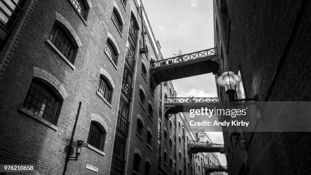 low angle view of shad thames street, london, uk - shad stock pictures, royalty-free photos & images