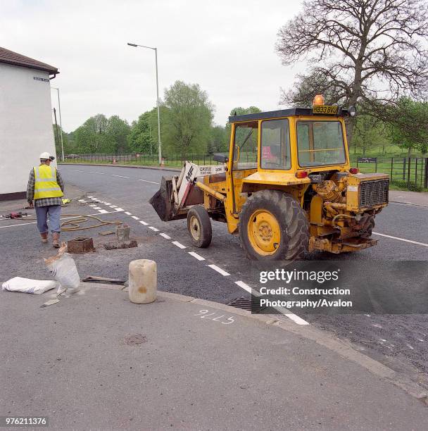 Adjusting level of service box cover and frame following highway resurfacing works. A4251 Hemel Hempstead to Berkhamsted road refurbishment scheme,...