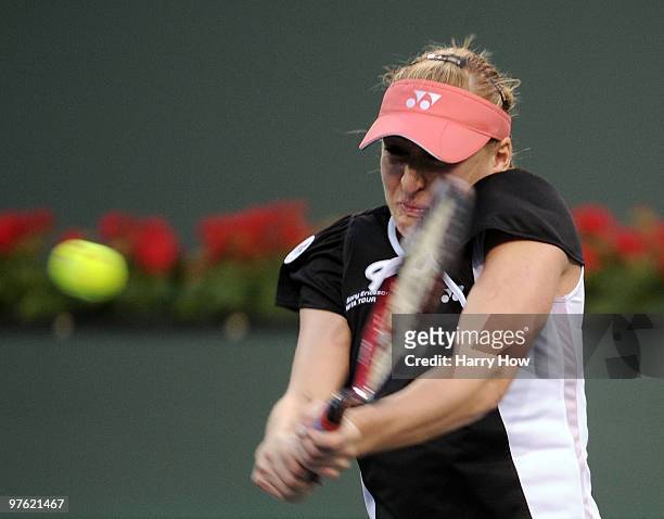 Elena Baltacha of Great Britain hits a backhand in her match against Alexa Glatch during the BNP Paribas Open at the Indian Wells Tennis Garden on...