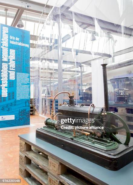 June 2018, Germany, Poessneck: A model steam engine at the exhibition 'Erlebnis Industriekultur - Innovatives Thu·ringen seit 1800' in Poessneck. The...