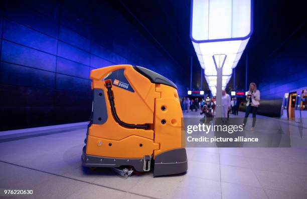 June 2018, Germany, Hamburg: An autonomous cleaning robot called 'Taski Swingobot 2000' drives across the U-Bahn station 'Hafencity Universitaet'...